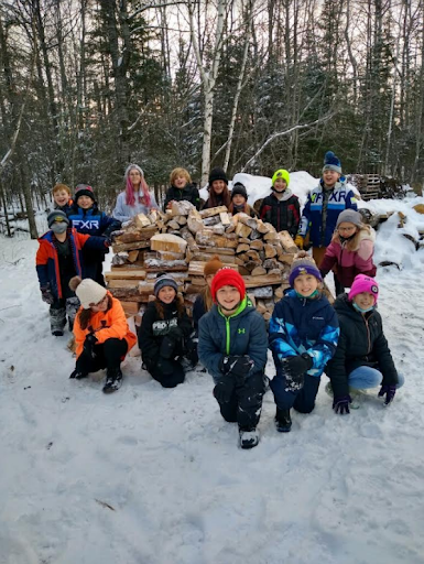 5th Grades Stack Wood for Community Campfire